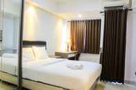 Kamar Tidur Fully Furnished and Spacious Studio Apartment at The Oasis Cikarang By Travelio