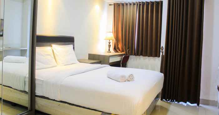 Kamar Tidur Fully Furnished and Spacious Studio Apartment at The Oasis Cikarang By Travelio