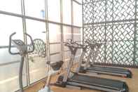 Fitness Center Fully Furnished and Spacious Studio Apartment at The Oasis Cikarang By Travelio