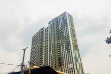 Bangunan Cozy Studio Apartment at Springwood Residence Tangerang By Travelio