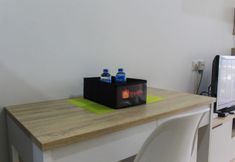 Kamar Tidur 4 Cozy Studio Apartment at Springwood Residence Tangerang By Travelio