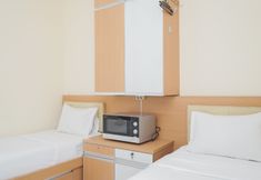 Kamar Tidur 2 Tidy and Minimalist Studio Apartment at Aeropolis Residence By Travelio