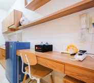 Bedroom 2 Comfort and Tidy Studio with Bunk Bed at Dave Apartment By Travelio