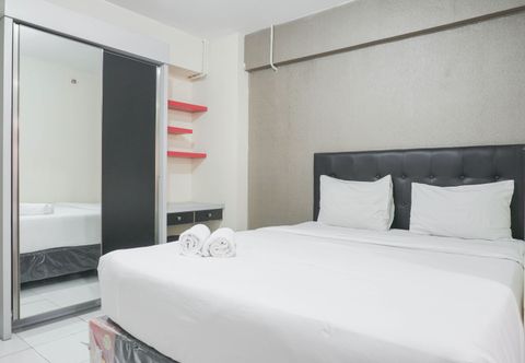 Bedroom Comfortable & Nice Studio at Kebagusan City By Travelio