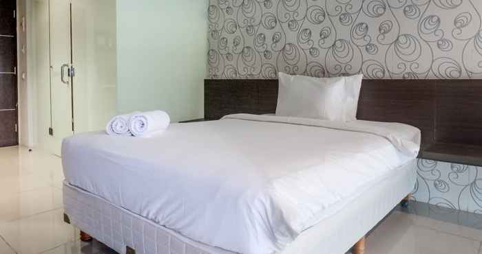 Bedroom Classic and Modern Studio Apartment at The Square Surabaya By Travelio