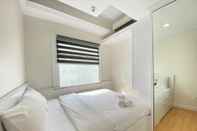 Bedroom Stylish and Deluxe 2BR at Grand Asia Afrika Apartment near Braga City Walk By Travelio