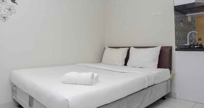 Kamar Tidur Comfy and Cozy Studio at Amethyst Apartment By Travelio
