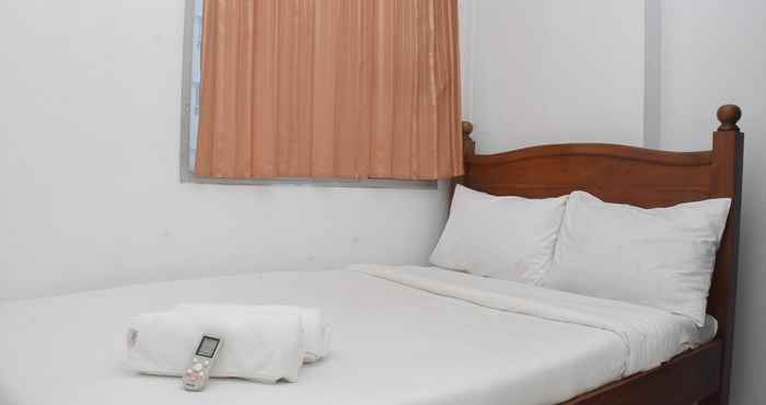 Bedroom Comfy and Private 2BR at Menteng Square Apartment By Travelio