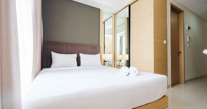 Bedroom Homey and New Furnished Studio at Sedayu City Suites Apartment By Travelio