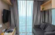 Common Space 2 Cozy Living 1BR Apartment at Grand Kamala Lagoon By Travelio