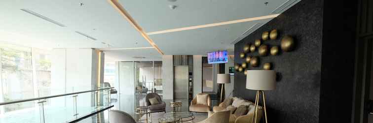 Lobby Fancy and Nice Studio at Menteng Park Apartment By Travelio