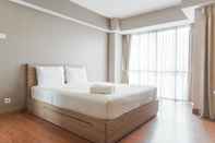 Kamar Tidur Nice and Comfortable Studio Apartement at H Residence By Travelio