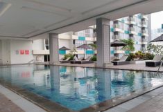 Swimming Pool 4 Nice and Comfortable Studio Apartement at H Residence By Travelio
