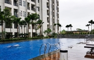 Swimming Pool 3 Cozy Minimalist 1BR at Saveria Apartment By Travelio