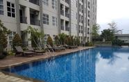 Swimming Pool 5 Cozy Minimalist 1BR at Saveria Apartment By Travelio