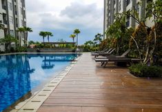 Swimming Pool 4 Artistic and Nice 1BR at Saveria Apartment By Travelio