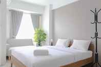 Kamar Tidur Cozy Living Studio at Urbantown Serpong Apartment By Travelio