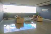 Lobby Comfy and Tidy 2BR Apartment at Park View Condominium By Travelio