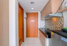 Common Space 4 Cozy Stay & Relaxing Studio Apartment at Margonda Residence 5 By Travelio