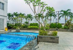 Swimming Pool 6 Cozy Stay & Relaxing Studio Apartment at Margonda Residence 5 By Travelio
