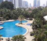 Swimming Pool 7 Luxury and Chic 3BR Apartment at Sudirman Tower Condominium By Travelio