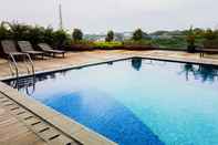 Swimming Pool Cozy and Nice Studio Tree Park BSD Apartment By Travelio