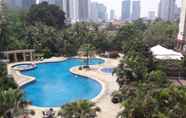 Swimming Pool 7 Spacious 2BR Apartment at Sudirman Tower Condominium By Travelio