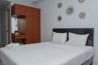 Bedroom 4 Comfort Studio Apartment at Patraland Urbano By Travelio