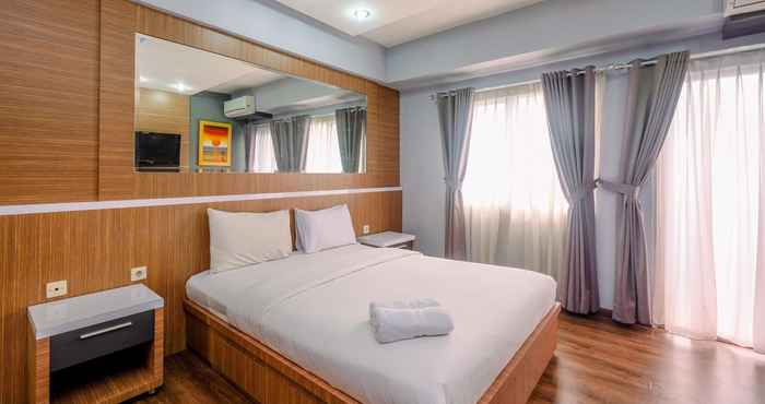 Bedroom Cozy Stay Studio Apartment Park View Condominium By Travelio