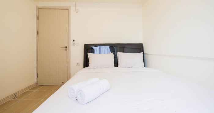 Kamar Tidur Cozy and Tidy 2BR at Meikarta Apartment By Travelio