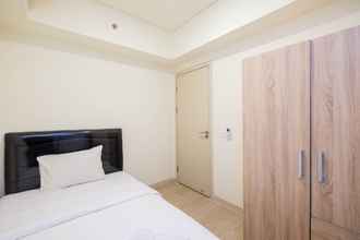 Kamar Tidur 4 Cozy and Tidy 2BR at Meikarta Apartment By Travelio