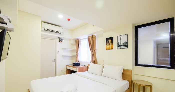Kamar Tidur Homey and Comfy Studio at Meikarta Apartment By Travelio