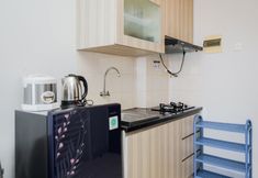 Common Space 3 Simply and Homey 2BR at Serpong Greenview Apartment By Travelio