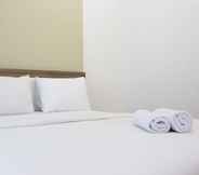 Bedroom 2 Cozy and Deluxe 1BR at Marbella Suites Dago Pakar Bandung Apartment By Travelio