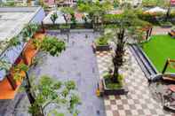 Bangunan Minimalist and Comfy Studio at Vida View Apartment By Travelio