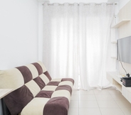 Common Space 2 Minimalist Comfy 1BR at Saveria Apartment By Travelio