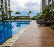 Swimming Pool 4 Minimalist Comfy 1BR at Saveria Apartment By Travelio