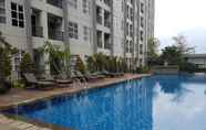 Kolam Renang 3 Minimalist Comfy 1BR at Saveria Apartment By Travelio