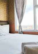 BEDROOM Luxurious 2BR Apartment at Vida View Makassar By Travelio