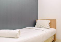 Bedroom 2 Alluring 2BR Apartment near Mall at Bassura City By Travelio