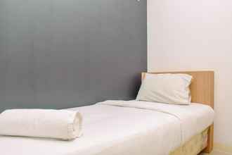 Kamar Tidur 4 Alluring 2BR Apartment near Mall at Bassura City By Travelio