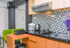 Common Space 4 Alluring 2BR Apartment near Mall at Bassura City By Travelio