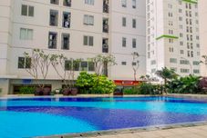 Swimming Pool Alluring 2BR Apartment near Mall at Bassura City By Travelio