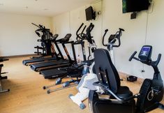 Fitness Center 7 Comfortable Studio at Tree Park BSD Apartment By Travelio