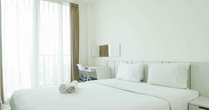 Kamar Tidur Comfortable Studio at Tree Park BSD Apartment By Travelio