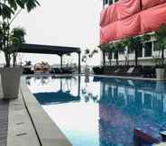 Swimming Pool 5 Comfort and Simply Studio at Gateway Park Apartment By Travelio