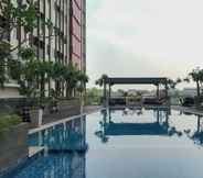 Swimming Pool 7 Comfort and Simply Studio at Gateway Park Apartment By Travelio