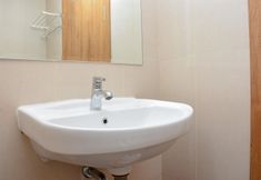 In-room Bathroom 3 Comfort and Simply Studio at Gateway Park Apartment By Travelio