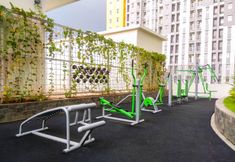 Fitness Center 6 Comfort and Simple Studio at Springlake Summarecon Bekasi Apartment By Travelio