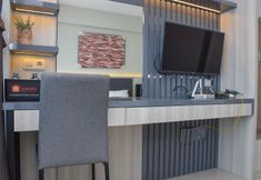Bedroom 2 Comfort and Simple Studio at Springlake Summarecon Bekasi Apartment By Travelio